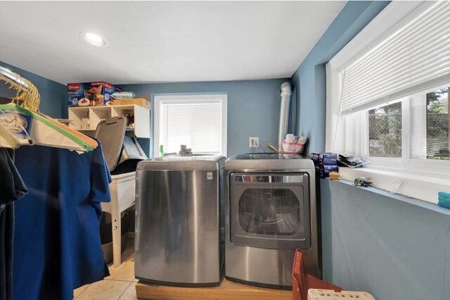 2816 Cuyler Ave, Berwyn, IL 60402 - laundry area featuring washing machine and clothes dryer, plenty of natural light, light tile patterned floors, and recessed lighting