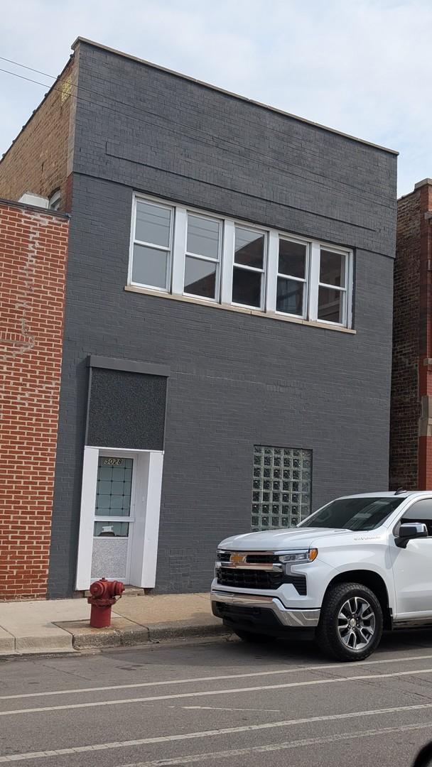 5028 W Lawrence Ave, Chicago, IL 60630 - view of front of property featuring brick siding