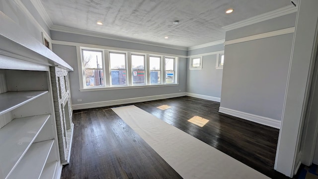 5028 W Lawrence Ave, Chicago, IL 60630 - spare room featuring dark wood finished floors, recessed lighting, and ornamental molding