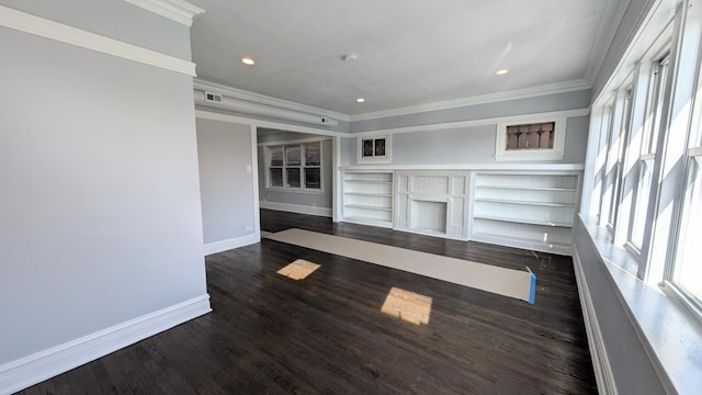 5028 W Lawrence Ave, Chicago, IL 60630 - spare room featuring ornamental molding, dark wood-type flooring, recessed lighting, and built in shelves