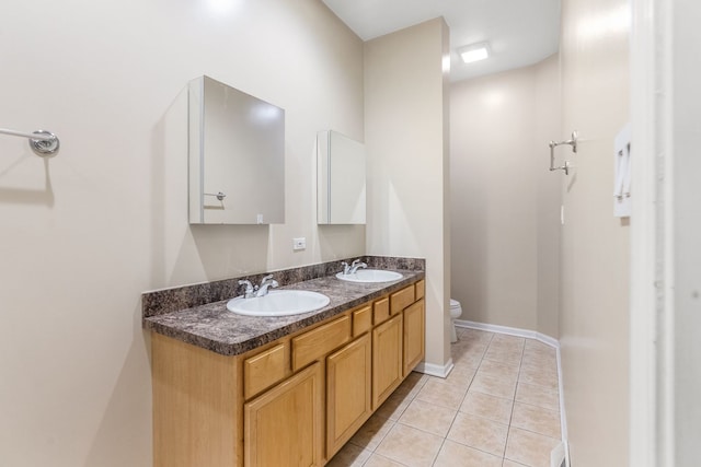 5028 W Lawrence Ave, Chicago, IL 60630 - full bathroom featuring double vanity and tile patterned flooring