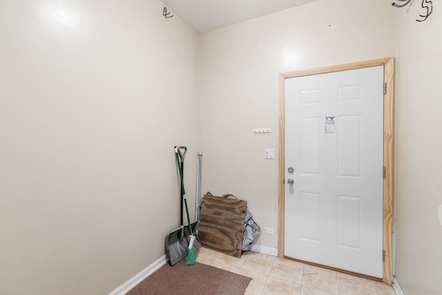 5028 W Lawrence Ave, Chicago, IL 60630 - entrance foyer with light tile patterned flooring and baseboards