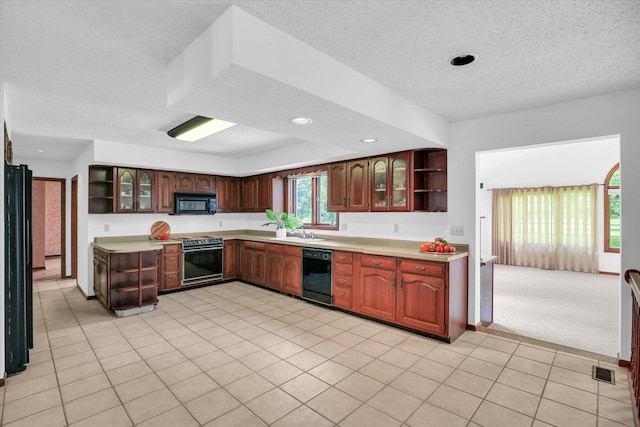 2904 Robeson Park Dr, Champaign, IL 61822 - kitchen with black appliances, open shelves, a textured ceiling, light countertops, and glass insert cabinets