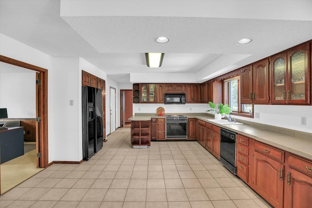2904 Robeson Park Dr, Champaign, IL 61822 - kitchen featuring black appliances, glass insert cabinets, light countertops, a textured ceiling, and recessed lighting