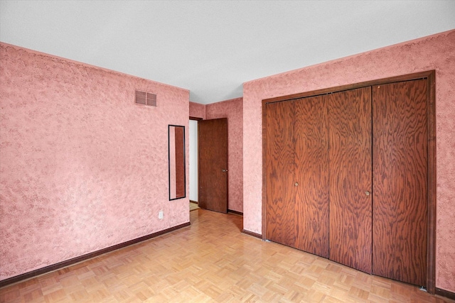2904 Robeson Park Dr, Champaign, IL 61822 - unfurnished bedroom with a closet and baseboards