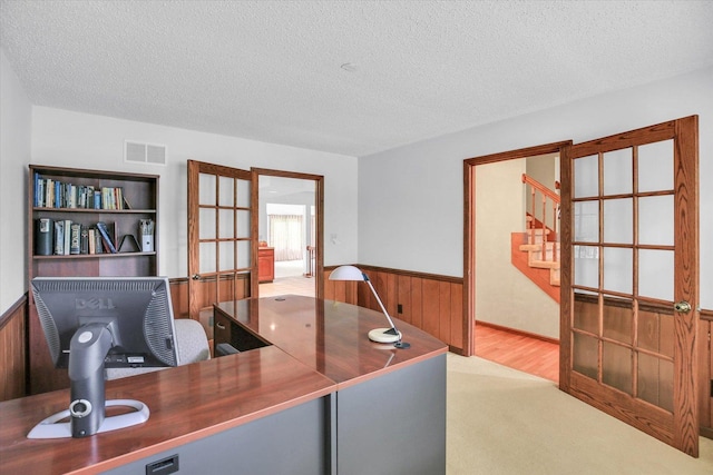 2904 Robeson Park Dr, Champaign, IL 61822 - carpeted office with a textured ceiling, wainscoting, and wood walls