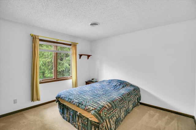 2904 Robeson Park Dr, Champaign, IL 61822 - carpeted bedroom with baseboards and a textured ceiling