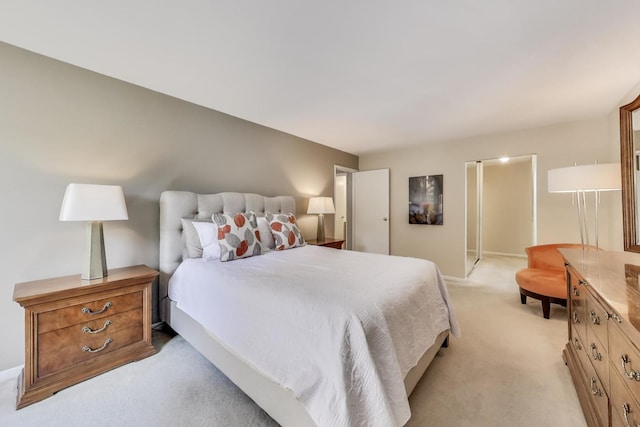 900 E Wilmette Rd Unit 205, Palatine, IL 60074 - bedroom with light carpet and baseboards