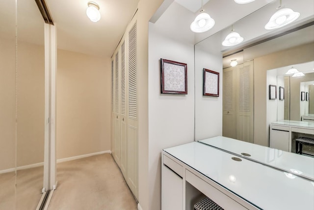 900 E Wilmette Rd Unit 205, Palatine, IL 60074 - bathroom with a closet and vanity