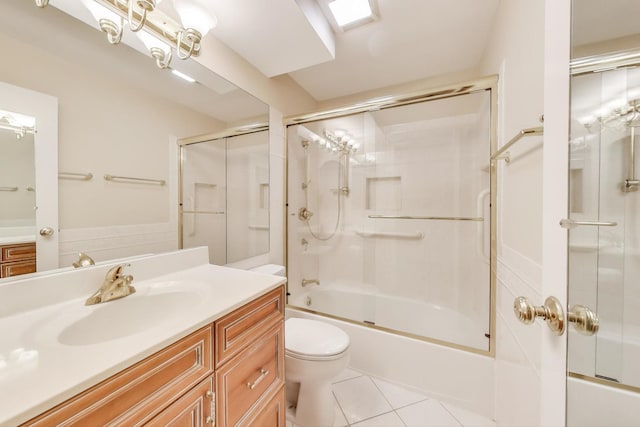 900 E Wilmette Rd Unit 205, Palatine, IL 60074 - bathroom featuring vanity, combined bath / shower with glass door, and tile patterned floors