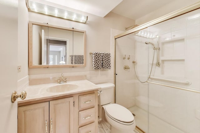 900 E Wilmette Rd Unit 205, Palatine, IL 60074 - full bath with a shower stall, vanity, and tile walls