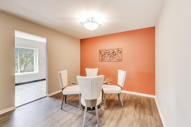 900 E Wilmette Rd Unit 205, Palatine, IL 60074 - dining area with wood finished floors and baseboards