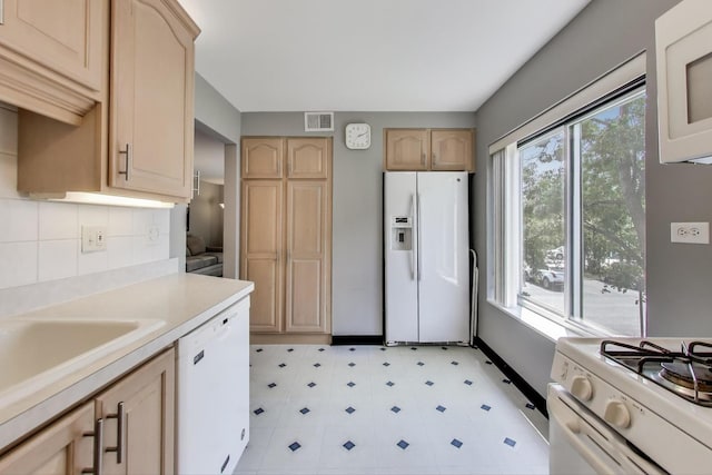 900 E Wilmette Rd Unit 205, Palatine, IL 60074 - kitchen with white appliances, light brown cabinets, light countertops, and light floors