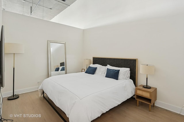 1800 W Grace St Unit 523, Chicago, IL 60613 - bedroom with wood finished floors and baseboards