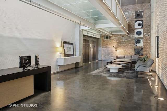 1800 W Grace St Unit 523, Chicago, IL 60613 - community lobby with brick wall and a high ceiling
