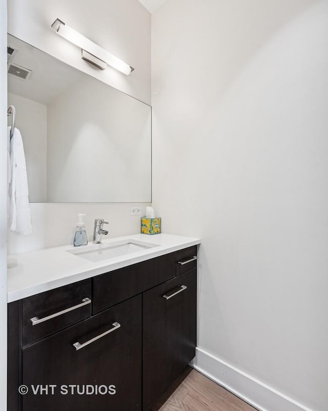 1800 W Grace St Unit 523, Chicago, IL 60613 - bathroom with vanity and wood finished floors