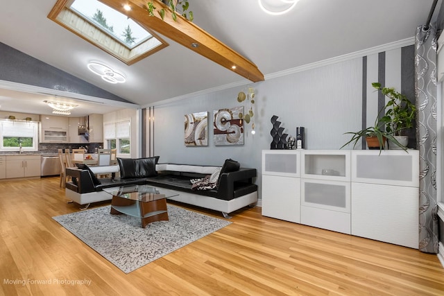 1145 S Chestnut Ave, Arlington Heights, IL 60005 - living area with light wood-type flooring, crown molding, a skylight, vaulted ceiling, and a chandelier