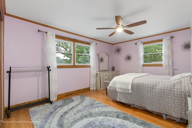 1145 S Chestnut Ave, Arlington Heights, IL 60005 - bedroom with wood finished floors, crown molding, and a ceiling fan