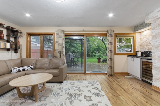 1145 S Chestnut Ave, Arlington Heights, IL 60005 - living room with wine cooler, light wood-style flooring, plenty of natural light, and recessed lighting