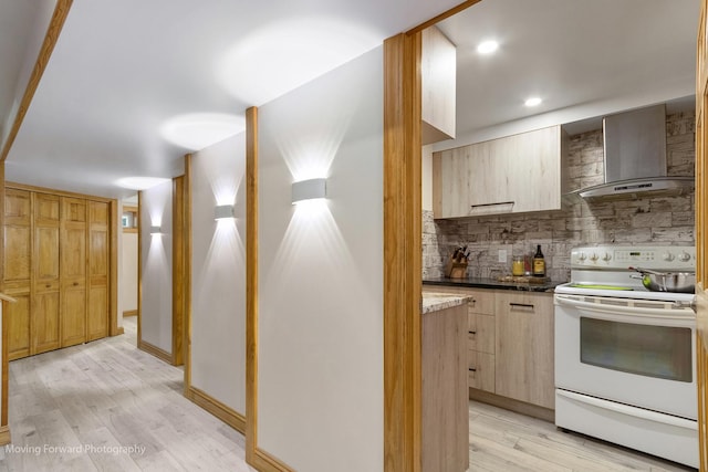1145 S Chestnut Ave, Arlington Heights, IL 60005 - kitchen featuring electric range, wall chimney range hood, light wood finished floors, decorative backsplash, and light brown cabinets