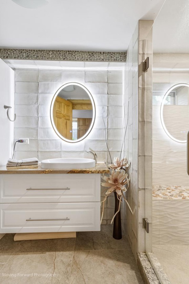 1145 S Chestnut Ave, Arlington Heights, IL 60005 - bathroom featuring tile walls, vanity, and a stall shower