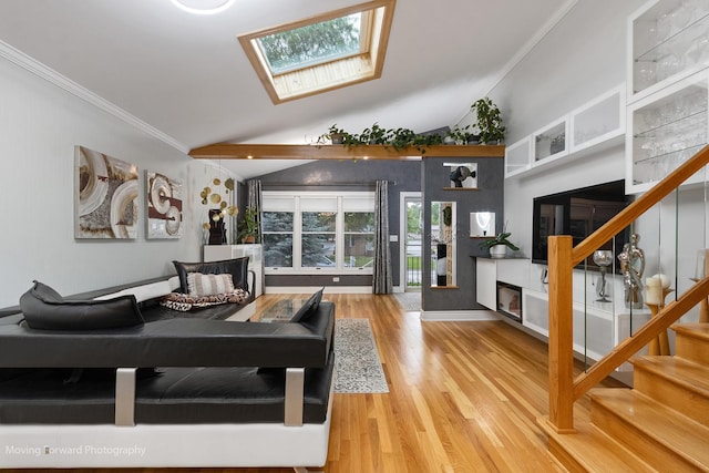 1145 S Chestnut Ave, Arlington Heights, IL 60005 - living area with a skylight, stairway, wood finished floors, crown molding, and vaulted ceiling