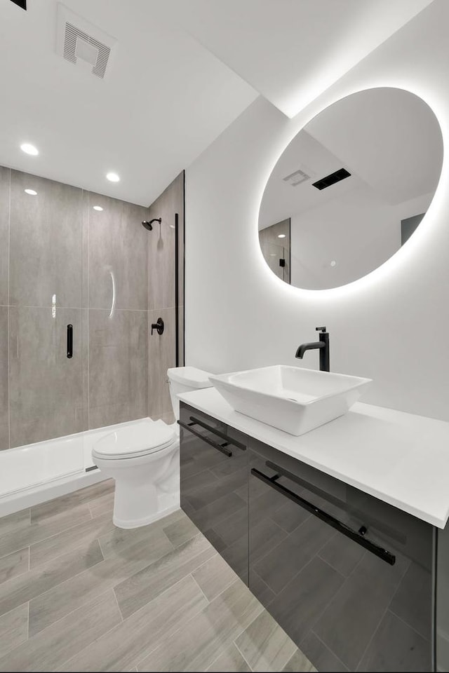 1444 W 49th Pl, Chicago, IL 60609 - bathroom featuring vanity, a tile shower, and recessed lighting