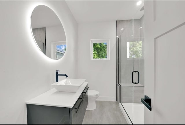 1444 W 49th Pl, Chicago, IL 60609 - full bathroom with vanity, a shower stall, and wood finished floors