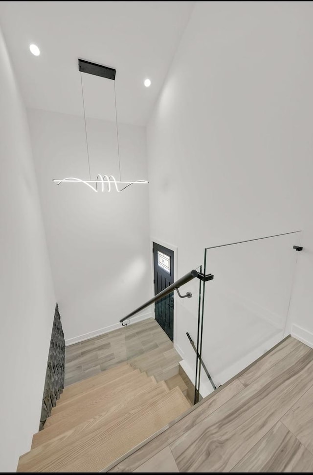 1444 W 49th Pl, Chicago, IL 60609 - stairs with wood finished floors, recessed lighting, and a towering ceiling