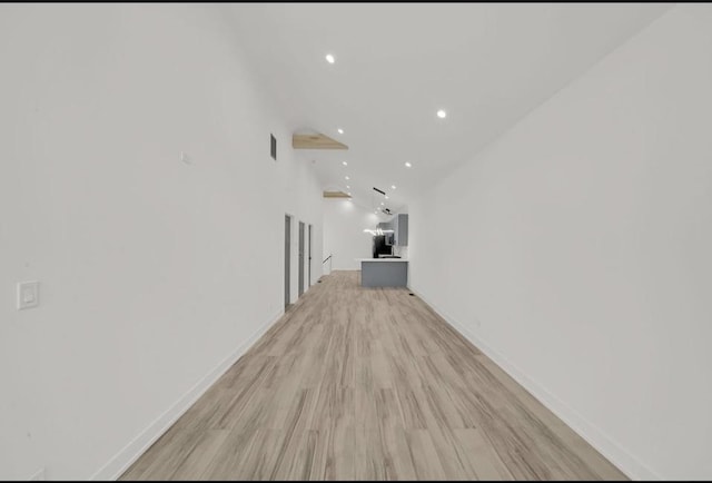1444 W 49th Pl, Chicago, IL 60609 - hallway with light wood-type flooring, recessed lighting, and high vaulted ceiling