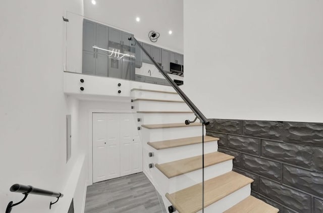 1444 W 49th Pl, Chicago, IL 60609 - stairs featuring wood finished floors and recessed lighting