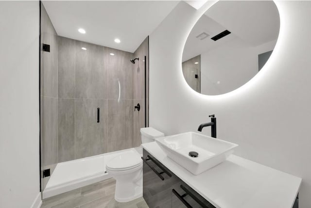 1444 W 49th Pl, Chicago, IL 60609 - bathroom featuring a stall shower, recessed lighting, and vanity