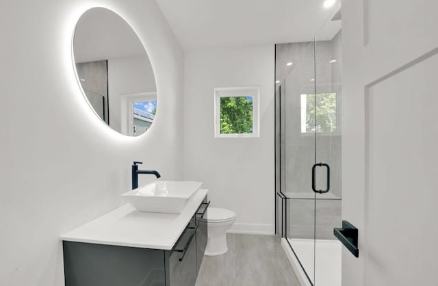 1444 W 49th Pl, Chicago, IL 60609 - bathroom featuring vanity, a stall shower, and wood finished floors