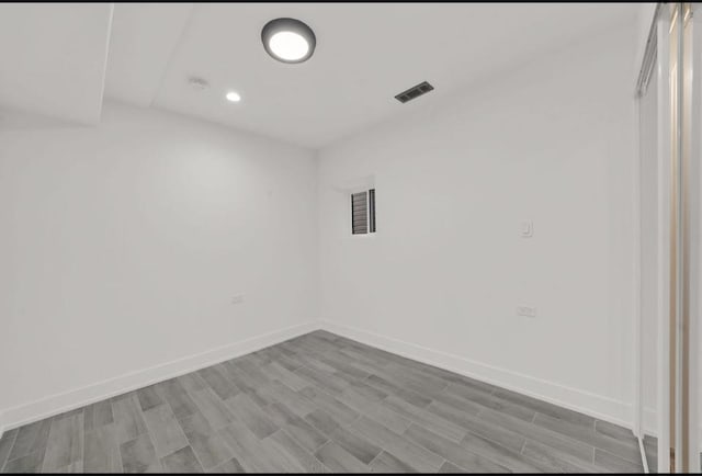 1444 W 49th Pl, Chicago, IL 60609 - spare room featuring recessed lighting and light wood-type flooring