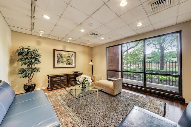 899 S Plymouth Ct Unit 1103, Chicago, IL 60605 - living room featuring wood finished floors and a drop ceiling