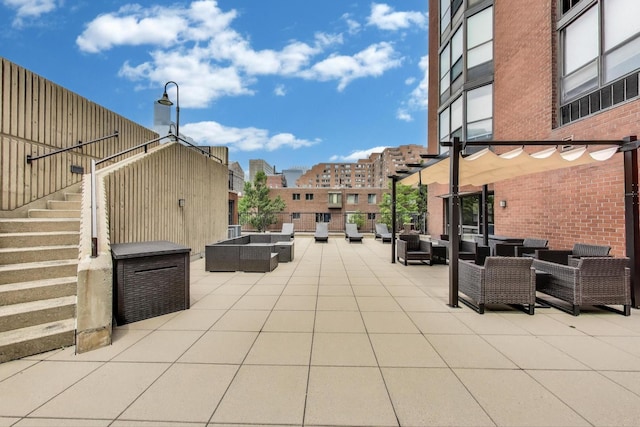 899 S Plymouth Ct Unit 1103, Chicago, IL 60605 - view of patio / terrace featuring an outdoor hangout area and stairway