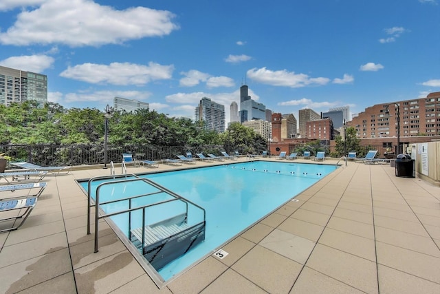 899 S Plymouth Ct Unit 1103, Chicago, IL 60605 - community pool featuring a view of city and a patio