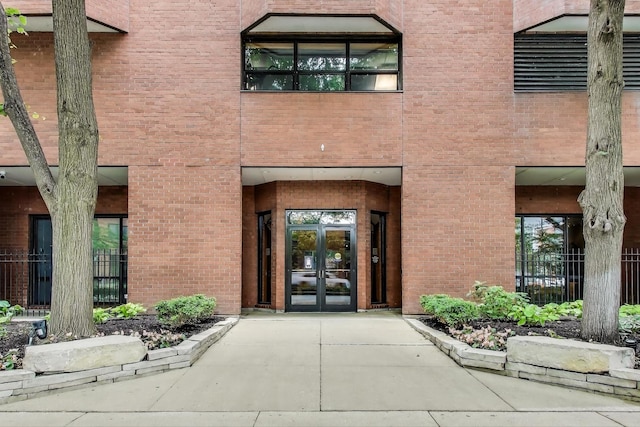 899 S Plymouth Ct Unit 1103, Chicago, IL 60605 - doorway to property featuring french doors and brick siding