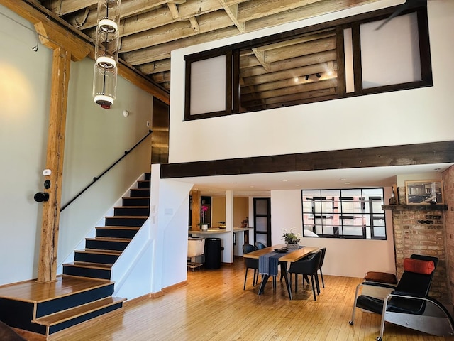 531 S Plymouth Ct Unit 602, Chicago, IL 60605 - dining room with hardwood / wood-style flooring, stairway, and a high ceiling