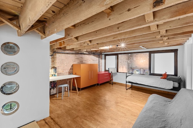 531 S Plymouth Ct Unit 602, Chicago, IL 60605 - bedroom featuring brick wall and wood finished floors