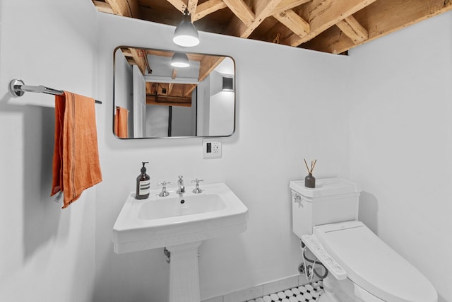 531 S Plymouth Ct Unit 602, Chicago, IL 60605 - half bathroom with toilet and tile patterned floors