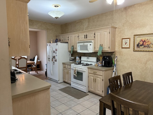 1927 Calla Dr, Joliet, IL 60435 - kitchen with white appliances, ceiling fan, light tile patterned flooring, and light countertops
