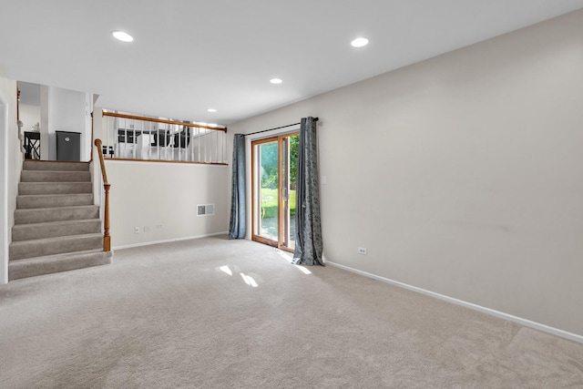 633 Buckthorn Ter, Buffalo Grove, IL 60089 - unfurnished living room with stairway, carpet floors, and recessed lighting