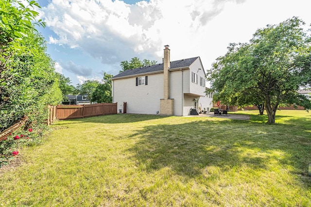 633 Buckthorn Ter, Buffalo Grove, IL 60089 - rear view of property featuring a chimney and a patio area
