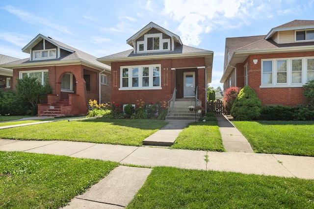 919 N Harvey Ave, Oak Park, IL 60302 - bungalow-style house featuring brick siding and a front lawn