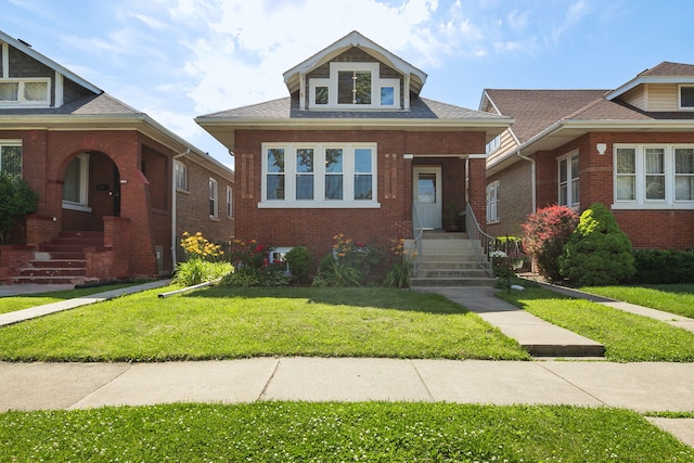 919 N Harvey Ave, Oak Park, IL 60302 - bungalow-style home featuring a front yard and brick siding