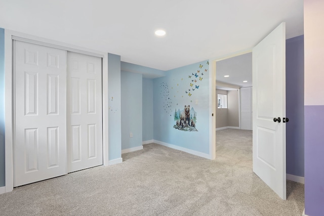 919 N Harvey Ave, Oak Park, IL 60302 - unfurnished bedroom featuring light colored carpet, a closet, and recessed lighting