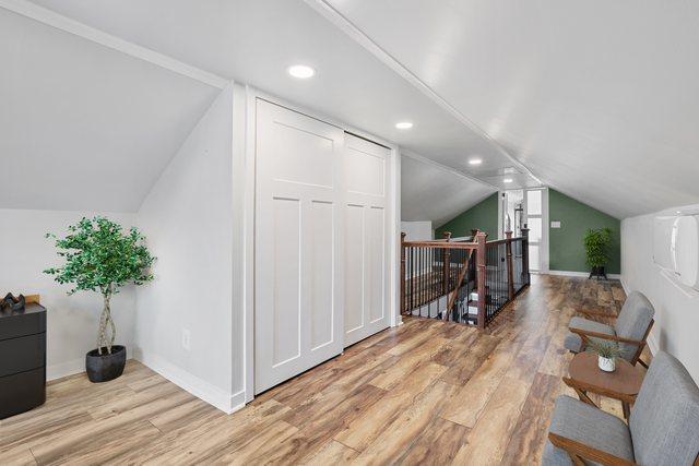 919 N Harvey Ave, Oak Park, IL 60302 - additional living space with wood finished floors, lofted ceiling, and recessed lighting