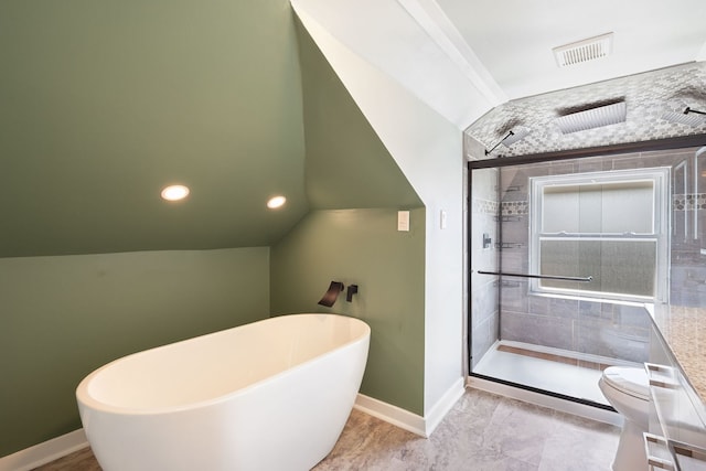 919 N Harvey Ave, Oak Park, IL 60302 - bathroom featuring a stall shower, a soaking tub, vaulted ceiling, and recessed lighting