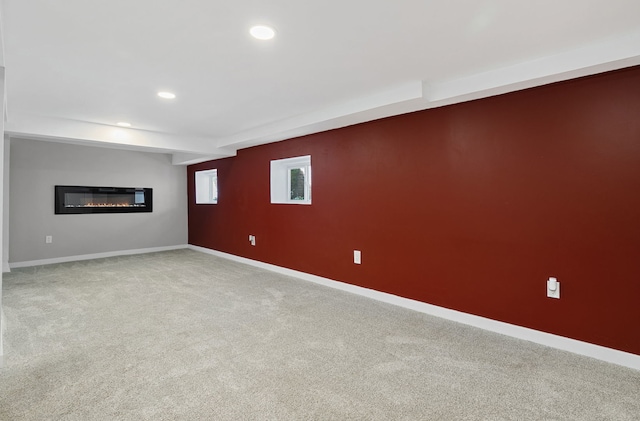 919 N Harvey Ave, Oak Park, IL 60302 - below grade area with carpet floors, recessed lighting, and a glass covered fireplace